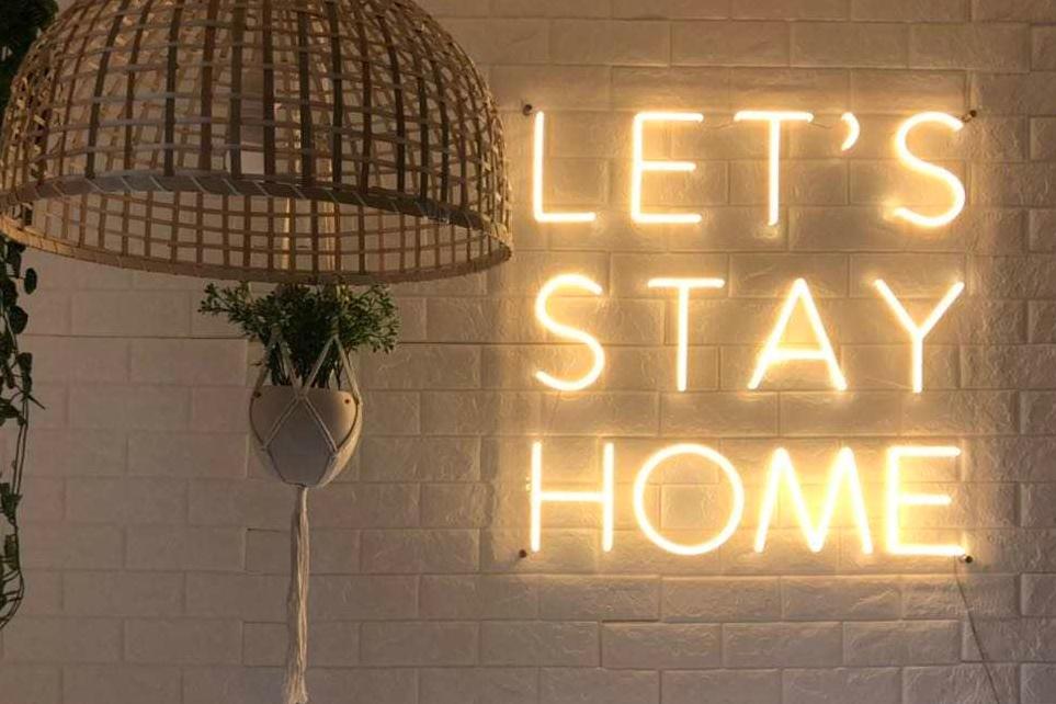 Lets stay home store neon sign